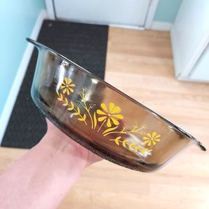 Pyrex or Glasbake amber casserole dishes with yellow cornflowers